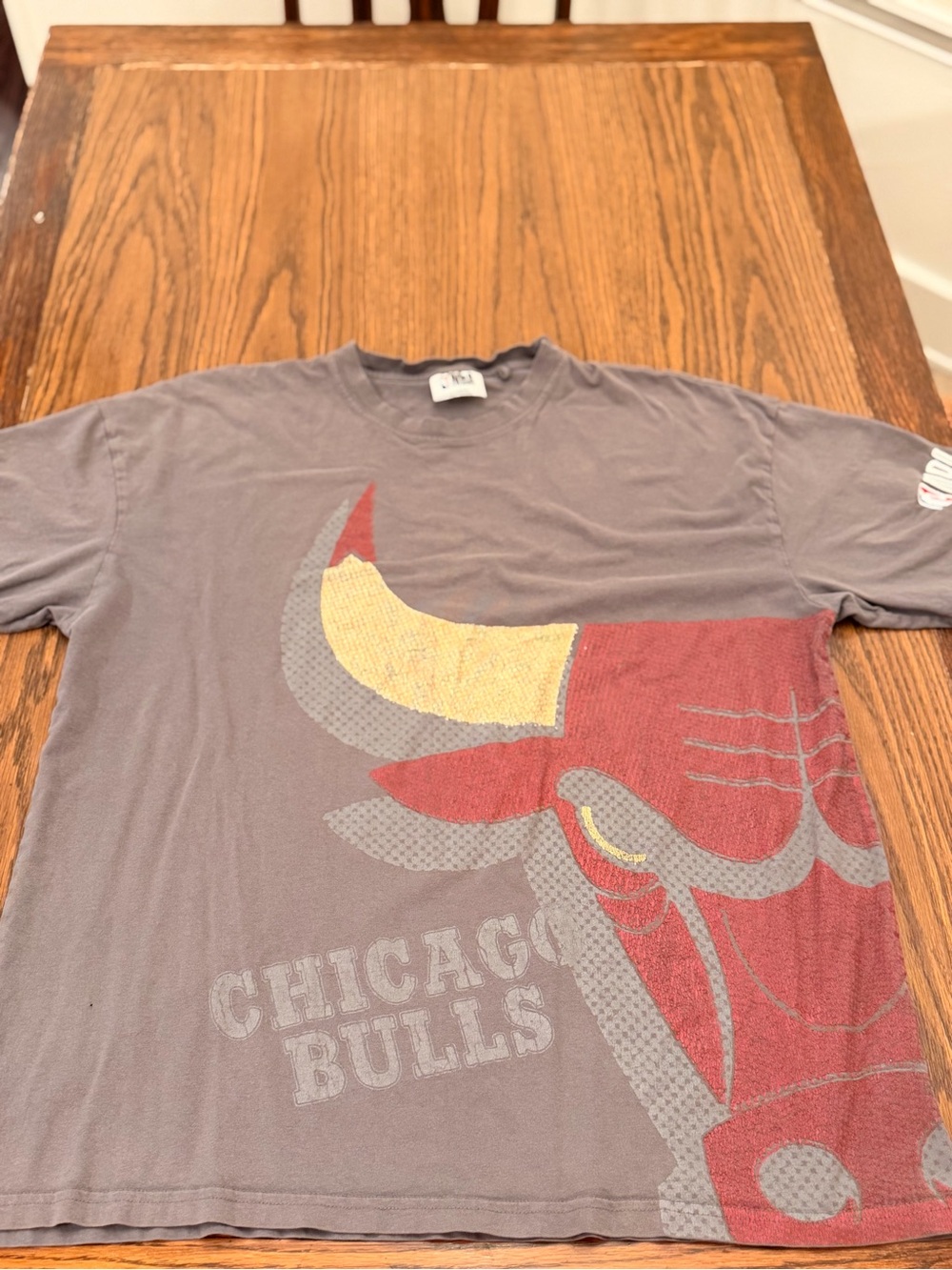 Vintage NBA Chicago Bulls Short Sleeve Graphic Tee in Gray with Red & Yellow